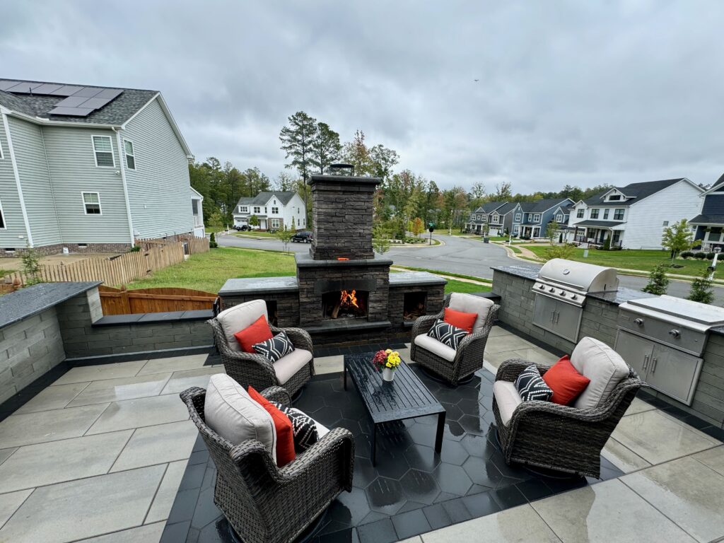 Patio with modern outdoor furniture and fire feature